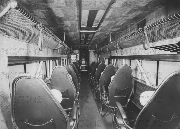 Aircraft interior of the 1930s. Interior of a Fokker aircraft with the cabin and seats, no passangers, probably a model F.XXII. 1930