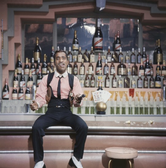 Sammy Davis Jr. 1925-1990. American singer, musician, dancer, actor. Pictured here when recording a televison show 1963