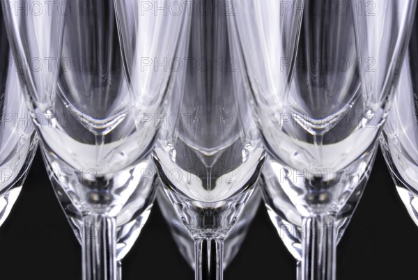 Champagne glasses in a black background
