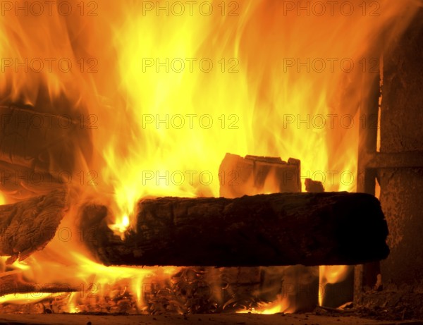 Fire place with flames and wood burning