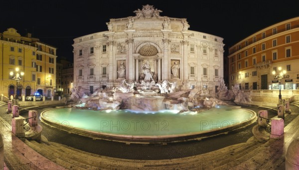 Panorama of Trevi Fountain without visitors at night. At 2:30 pm they closed the fountain for cleaning and repelled all the visitors. Color adjustments for a warmer and more pleasing look
