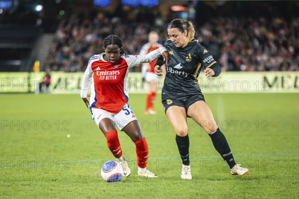 MELBOURNE, AUSTRALIA, MAY 24: Vivienne Lia of Arsenal Women FC competes against Michaela Foster of A-League All Stars Women team during the Global Football Week at Marvel Stadium on May 24, 2024 in Melbourne, Australia