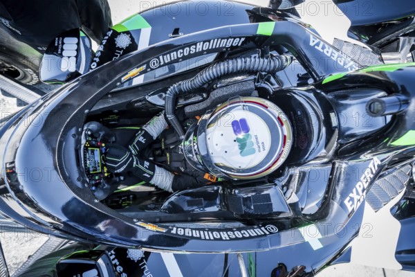 AGUSTIN HUGO CANAPINO (78) of Arrecifes, Argentina straps into his vehicle as he prepares to practice for the Firestone Grand Prix of Monterey at WeatherTech Raceway Laguna Seca in Salinas, CA
