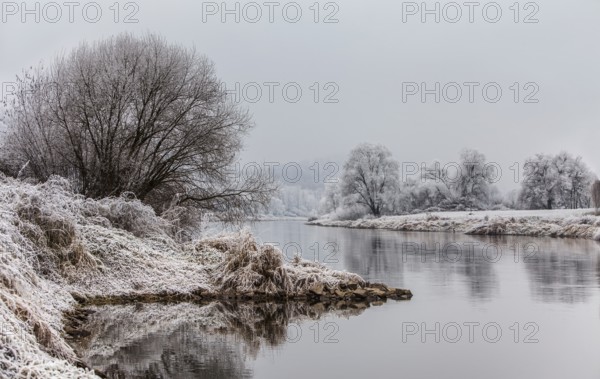 Landscape with River Weser near Wesertal in winter, district of Kassel, Hesse, Germany
