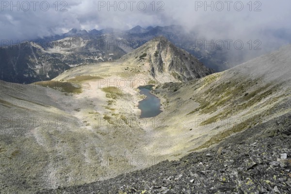 Gazei Lake and the peak of the same name dominate a wild valley in Pirin National Park, Bulgaria