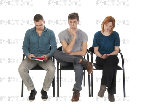 Young people are waiting in a room