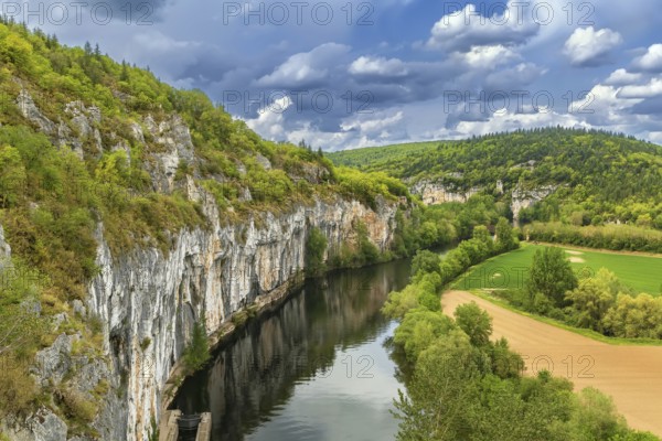 Landscape with rocky shore of Lot river, France