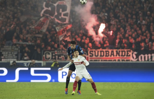Football match, Berat DJIMSITI Atalanta Bergamo at the back heads the ball past Fabian RIEDER VFB Stuttgart, Stuttgart Arena, Stuttgart