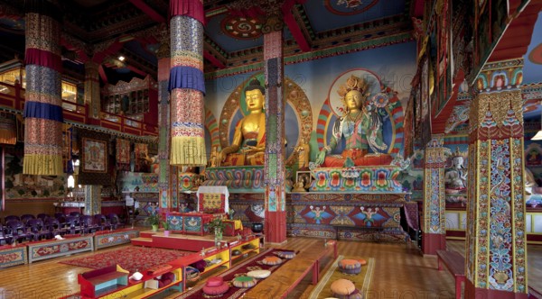 La Boulaye, TEMPLE OF THE 1000 BUDDHAS, founded in 1987 by Tibetan monks. Lamaist centre combined with a university for Tibetology, interior with seated Buddha (left)