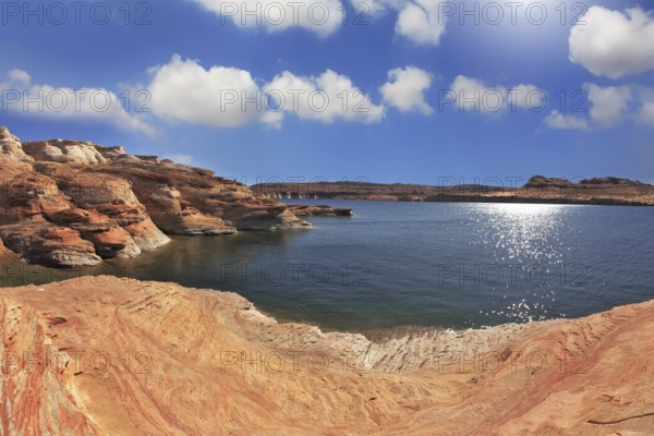 Photo taken fisheye lens. Midday heat. The artificial Lake Powell in the red desert of California