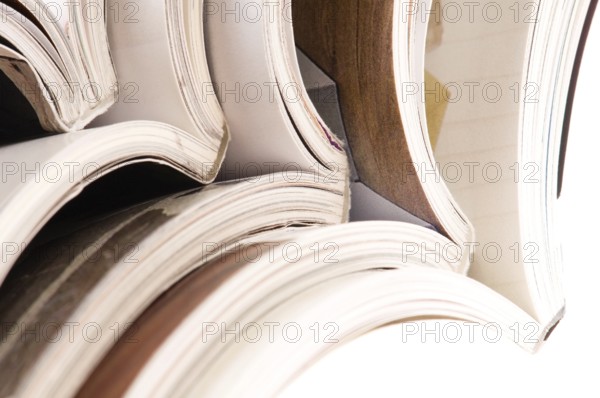 Stack of open magazines
