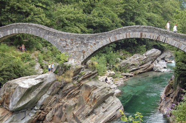 Stone arches of the ancient Roman bridge Ponte dei Salti, Val Verzasca, Switzerland, 17 July 2008