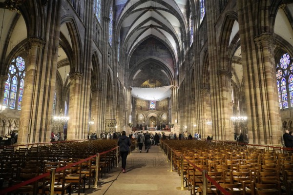 Strasbourg Cathedral, Cathedral of Our Lady, Cathédrale Notre-Dame, Cathedral, Strasbourg, Strasbourg, Bas-Rhin, Alsace, Alsace, France, Gothic church full of chairs with people visiting the room, Strasbourg, Strasbourg, Bas-Rhin, Alsace, Alsace, France