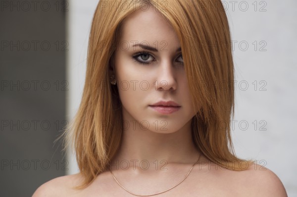 Attractive young caucasian woman in white short dress