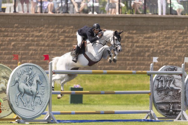 Eugenio Garza Perez of Mexico and riding Contago, compete in the 1.60m Grand Prix during The Continental international competition at Spruce Meadows, in Calgary, Canada, North America