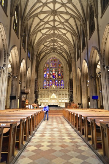 Manhattan, New York City, New York, USA, North America, Slow view through the church interior of Trinity Church with its impressive stained glass windows