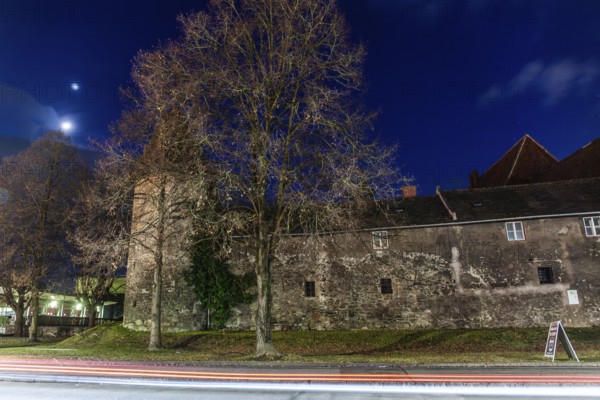 Moonlight over the wall of Göß Abbey, traces of light, former convent of the Benedictine nuns, blue hour, Leoben, Styria, Austria