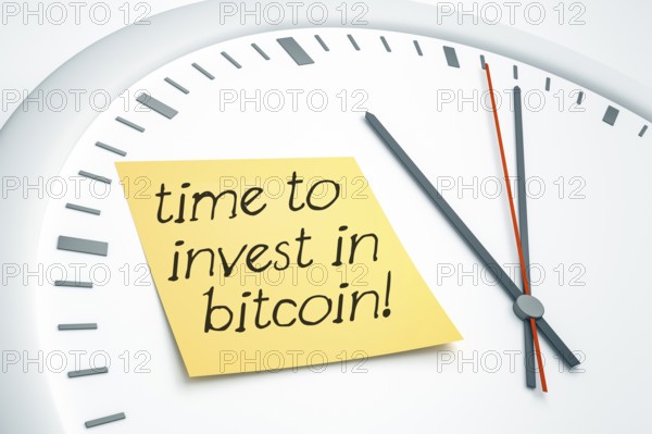3D illustration of a bright clock with a sticky note and the message time to invest in bitcoin