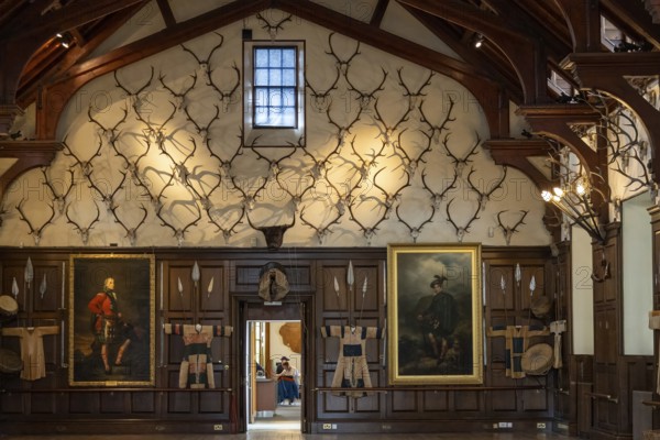 PITLOCHRY, PERTHSHIRE, SCOTLAND, UK, MAY 28. The Ballroom of Blair Atholl Castle near Pitchlochry in Scotland on May 28, 2024. Two unidentified people