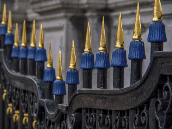 Close-up of an ornate iron fence with blue and gold spikes, Hoorn, Netherlands
