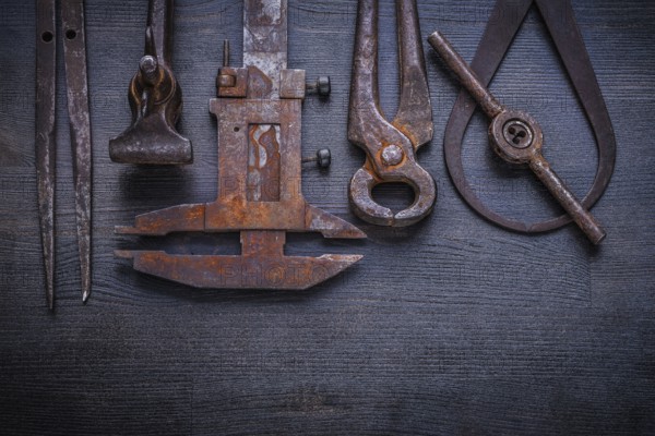 Set of old tools on vintage board