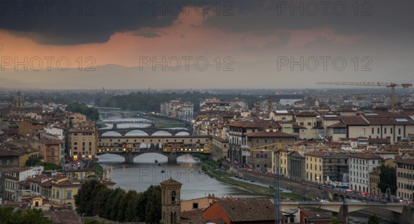 Panoramic skyline of the historical city of Florence in Italy from Michelangelo piazza just before the sunset