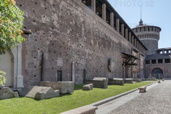 Inside the Sforza Castle (Castello Sforzesco) in Milan (ITALY). One of the main travel attractions of Milan, this castle was built in 15th century by Duke of Milan Francesco Sforza. Milan, ITALY - June 22, 2020
