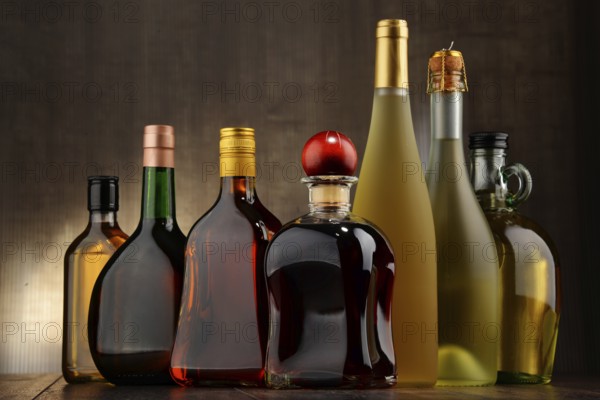 Composition with bottles of assorted alcoholic beverages
