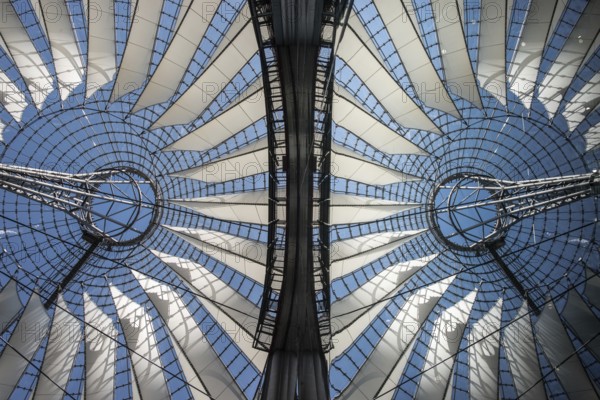 Roof of the Sony Center. Sony Centre, designed by Helmut Jahn, is an eye-catching monolith of glass and steel featuring an enormous tent-like conical roof, its shape reportedly inspired by Mount Fuji in Japan, covering an elliptical central public space up to 102 metres across