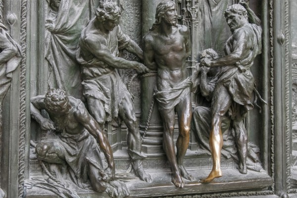 MILAN, ITALY/EUROPE - FEBRUARY 23 : Detail of the main door at the Duomo Cathedral in Milan Italy on February 23, 2008