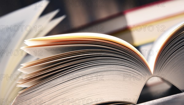 Composition with open book on the table