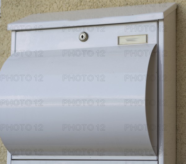 Modern white metal post box, Austria