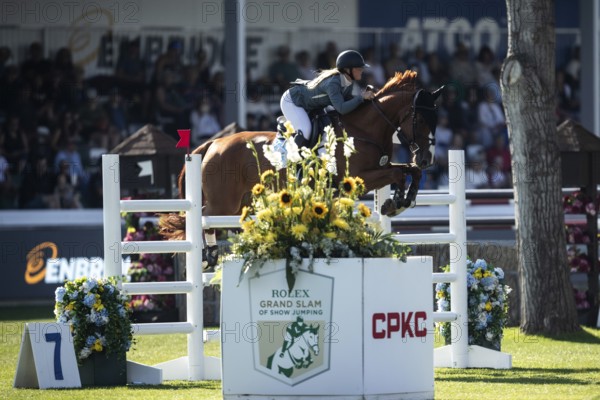 Jaydan Stettner of Canada and riding Ielinea JTL competes in the 1.45m Enbridge Cup at the Spruce Meadows, Masters, in Calgary, Alberta, Canada, North America