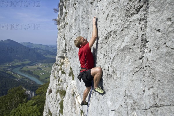 A man climbs a rock face, Lossenstein, 35, years