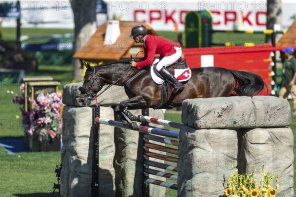 Pius Schwizer of Switzerland, riding Vancouver de Lanlore competes in the BMO Nations Cup during the CSIO Spruce Meadows, Masters, in Calgary, Alberta, Canada, North America