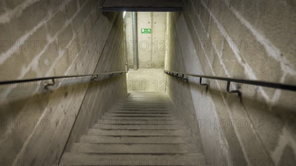 An image of stairs down to the basement