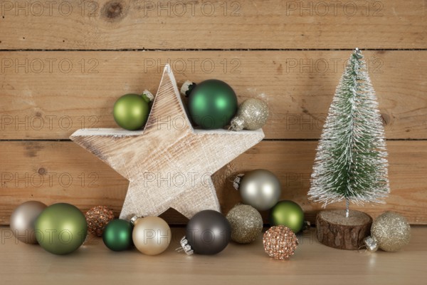 Christmas decoration glass balls with wooden star and fir tree