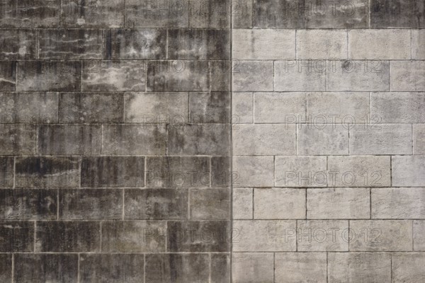 Weathering and water residue have washed out to form a striking pattern on a wall