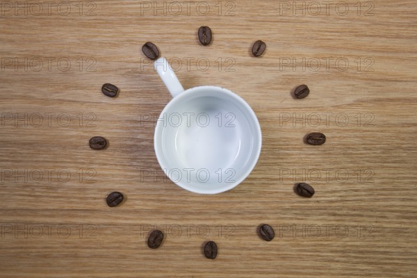 Coffee Time - Empty coffee cup and clock of coffee beans