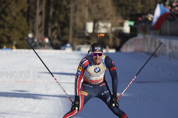Sturla Holm Laegreid (Norway/NOR) crossing the finish line in the sprint at the IBU Biathlon World Championships Lenzerheide 2025, Lenzerheide, Switzerland / SUI / CH