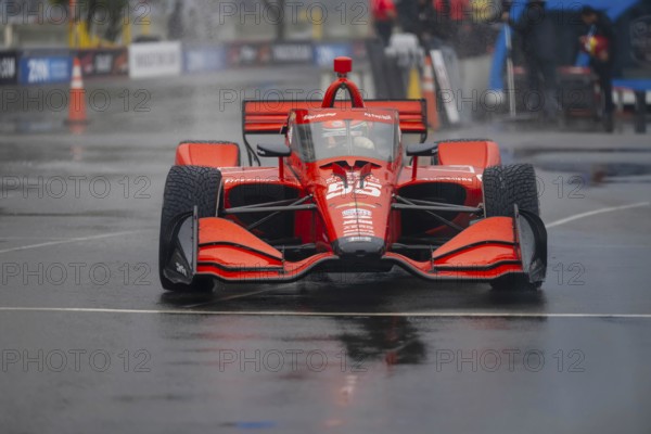 INDYCAR Series driver, BENJAMIN PEDERSEN (R) (55) of Copenhagen, Denmark, travels through the turns during a wet and dangerous practice session for the Big Machine Music City Grand Prix at Streets of Nashville in Nashville TN