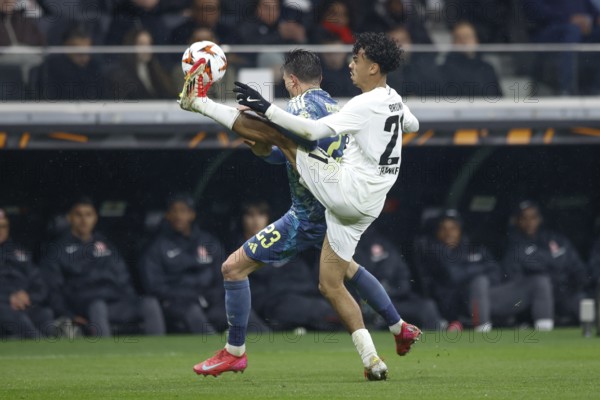 Football, Europa League, round of 16 second leg, 2024/2025, Eintracht Frankfurt vs. Ajax Amsterdam, 13/03/2025, Frankfurt Stadion, Frankfurt, Germany, Nathaniel BROWN (Eintracht Frankfurt, 21) in duel with Steven BERGHUIS (Ajax Amsterdam, 23)