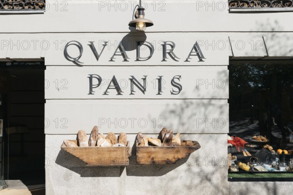 Madrid, Spain, April 14, 2019: Showcase of Artisan Bakery in Historical Centre of Madrid. The Name of the Bakery is Quadra Panis