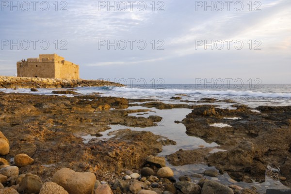 Paphos castle at down. Coastal ancient historic castle landmark at Paphos harbor Cyprus