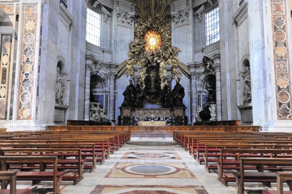 St Peter's Basilica, Vatican, Rome, Lazio, Italy, Europe, Large church with impressive altar and long rows of benches