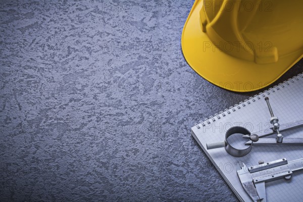 Notebook hard hat divider vernier scale copyspace construction concept