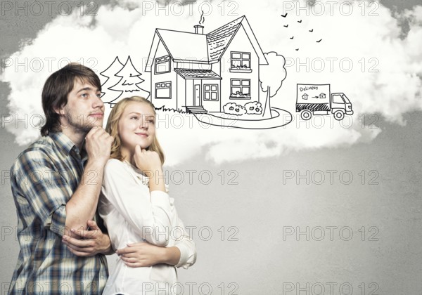 Loving young couple hugging each other and dreaming