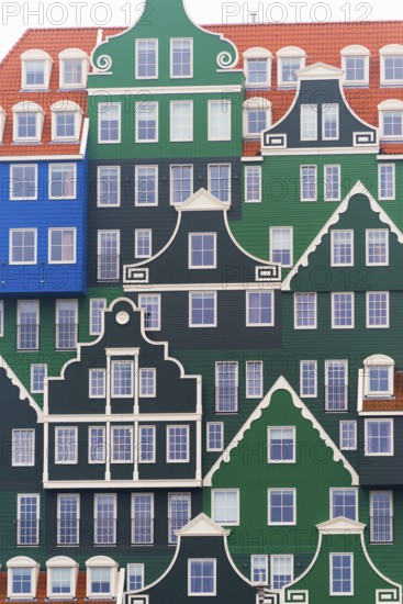 ZAANSTAD, NETHERLANDS, NOVEMBER 13, 2016: Typical facade of the Inntel hotel, opened in 2010. It is an accumulation of almost seventy separate Zaanse houses, executed in four colors Zaans green