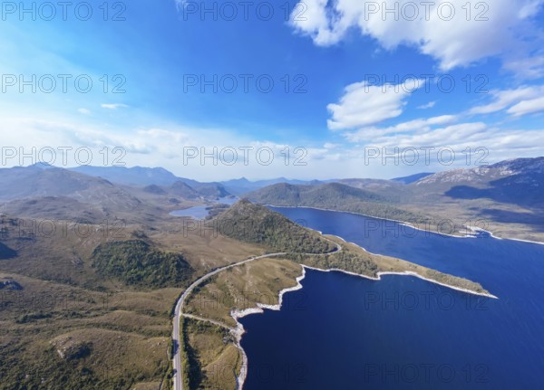 Aerial landscape of Lake Plimsoll on a hot summer's afternoon in Tasmania, Australia