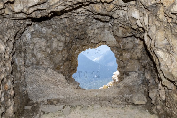View out of a loophole of the Mount Lagazuoi tunnels, built during the First World War, the Dolomite Alps in South Tirol